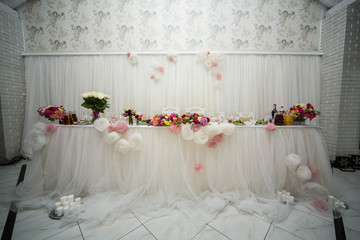 Beautifuly decorated wedding reception table covered with fresh