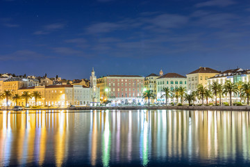 Fototapeta na wymiar Cityscape of old traditional city Split, night scene. / Waterfront view at old, traditional city Split in Croatia. Cityscape photography during night, long exposure.