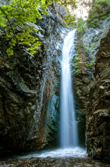 Fototapeta na wymiar Forest waterfall