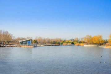 Obraz premium Small house at the frozen lake.