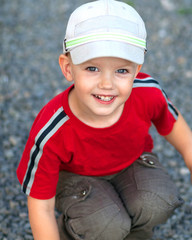 The little funny boy closeup portrait in good mood