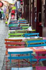 Paris - Very colorful Parisian outdoor cafe in Montmartre