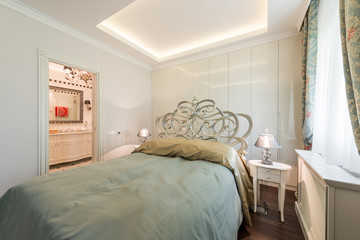 Luxurious double bedroom with king size bed, luxury designer furniture and private ensuite
