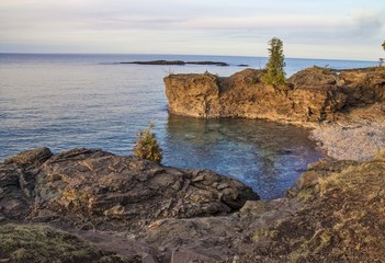 Smugglers Cove. The rugged Lake Superior coast  in Presque Isle Park. Marquette, Michigan.