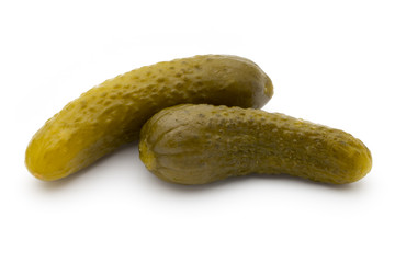 Pickled cucumbers isolated on white background.