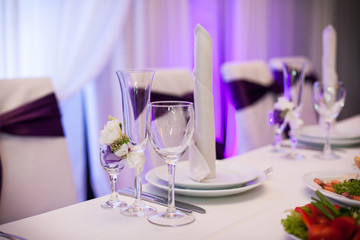 Tablewear and silverware closeup at wedding reception table elegant and minimalistic