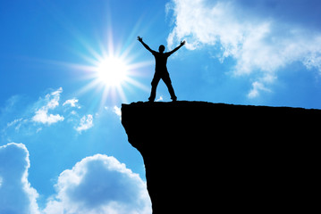 Man on the mountain edge