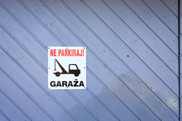 No parking area sign
