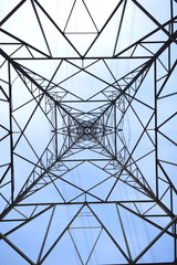 High voltage transmission tower taken from low angle  as abstract background