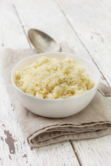 cooked couscous in a white bowl