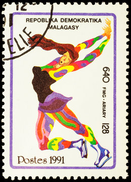Colored picture of figure skater on post stamp