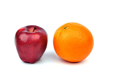 Orange and apple on white background