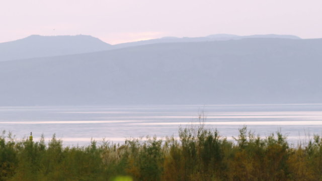 Royalty Free Stock Video Footage of the shore of the Sea of Galilee shot in Israel at 4k with Red.