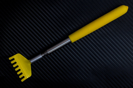Colorful metallic back scratcher.