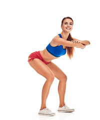 young woman with slim body. squatting