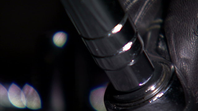 Close up of an adapter being attached to a socket wrench.