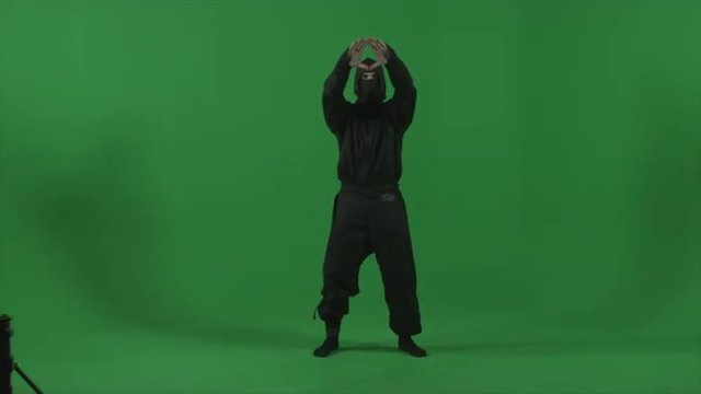 Ninja expertly moves through fighting forms in studio