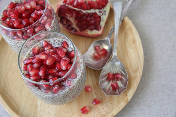 Chia seeds pudding with pomegranate, selective focus