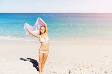 Young woman relaxing on the beach