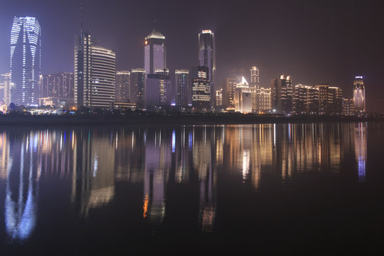 Nanchang, China - January 3, 2016: Nanchang skyline at night as seen from the east side of the city. Nanchang is the capital of Jianxi province in China