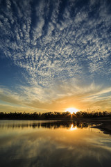 Sunset Reflections with Cloud Patterns.