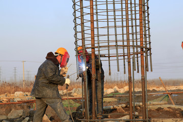 Bridge construction under performing the steel reinforcement of