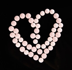 Heart shape pink  pills