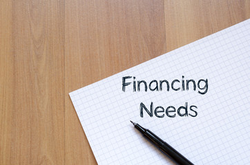 Financing needs write on notebook