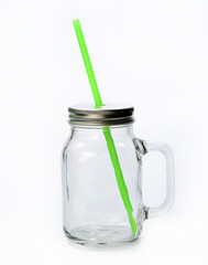 Empty jar with Straw on white background