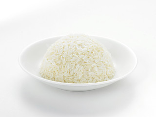 Dish full of rice on white background