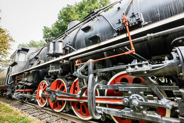 Fototapeta na wymiar Wheels of vintage steam train