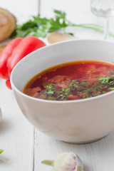 big bowl of borscht with herbs