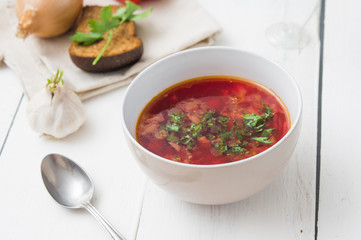 big bowl of borscht with herbs