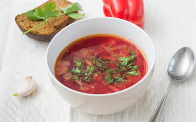 big bowl of borscht with herbs