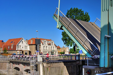 people waiting for open bridge in Furnes, Veurne for boat on Canal de Furnes