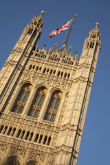 Fototapeta na wymiar Houses of Parliament and Union Jack Flag; London, England, UK