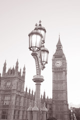 Fototapeta na wymiar Lamppost and Houses of Parliament with Big Ben, London in Black and White Sepia Tone