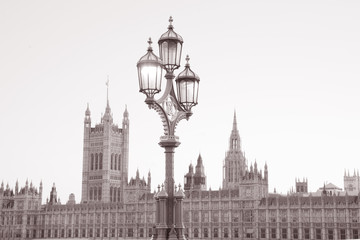 Fototapeta na wymiar Lamppost and the Houses of Parliament; London, UK in Black and White Sepia Tone