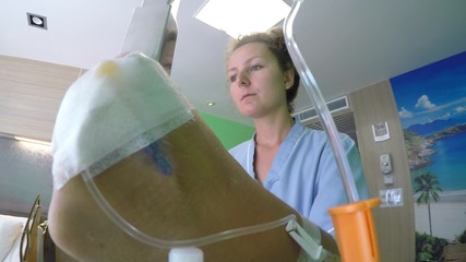 Woman Patient Walking with Drop Counter in Hospital. 2.7K