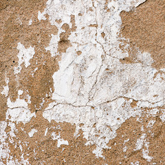 Old, grungy white background of natural plaster wall surface.