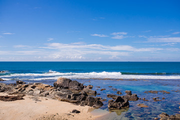 Fototapeta na wymiar stones on the beach at sunset in Sri Lanka