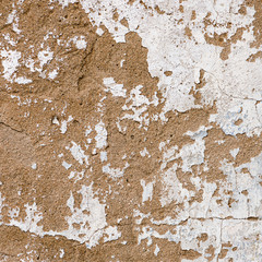 Old, grungy white background of natural plaster wall surface.