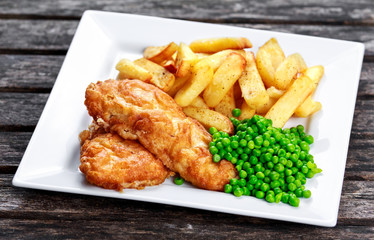 Traditional Fish and chips with peas