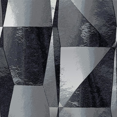 Abstract black, silver and white scratched background of brushed polygons resembling metal foil