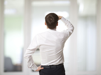 Businessman looking through the window
