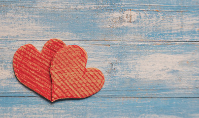 Crate paper Heart,Red heart,Blue wooden floor.