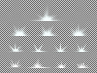 Obraz premium Vector set of glowing light bursts with sparkles on transparent background