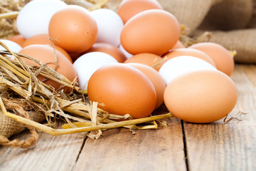 Eggs on wooden background
