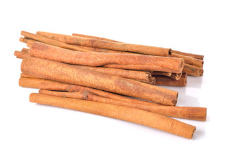 Cinnamon sticks on white background
