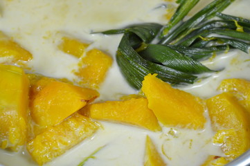 Fototapeta na wymiar pumpkin boiled in coconut milk Thai dessert